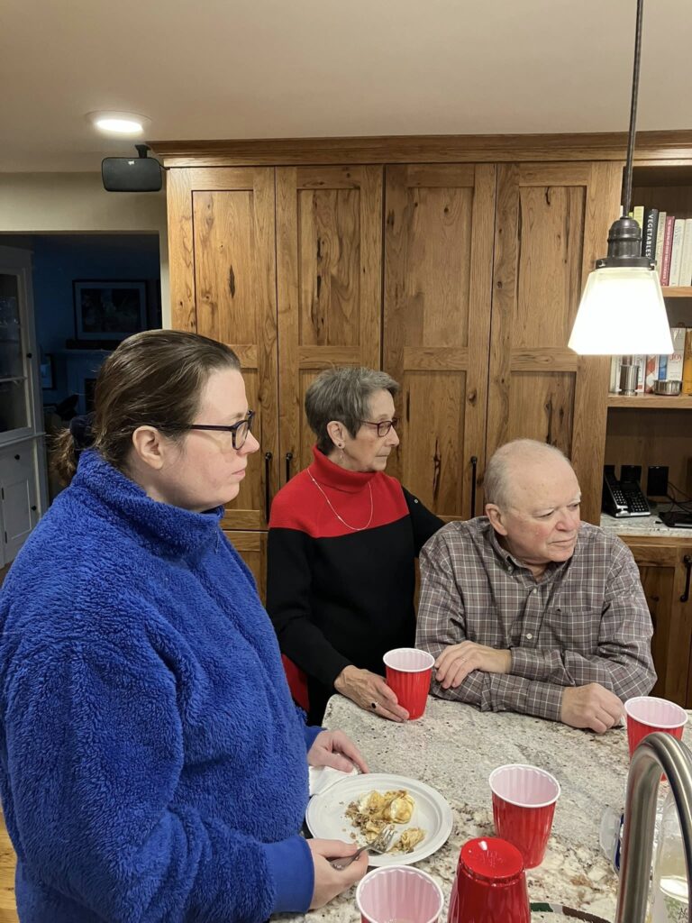 LGBTQ+ Newton members gathered in kitchen for Thanksgiving