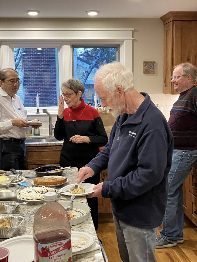LGBTQ+ Newton members gathered in kitchen for Thanksgiving