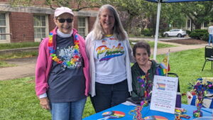 Marcia Johnson, Rosa Buffone and Sandy Rice host a table for LGBTQ+ Newton at Newton's Celebration of Queer Culture on June 28, 2025.
