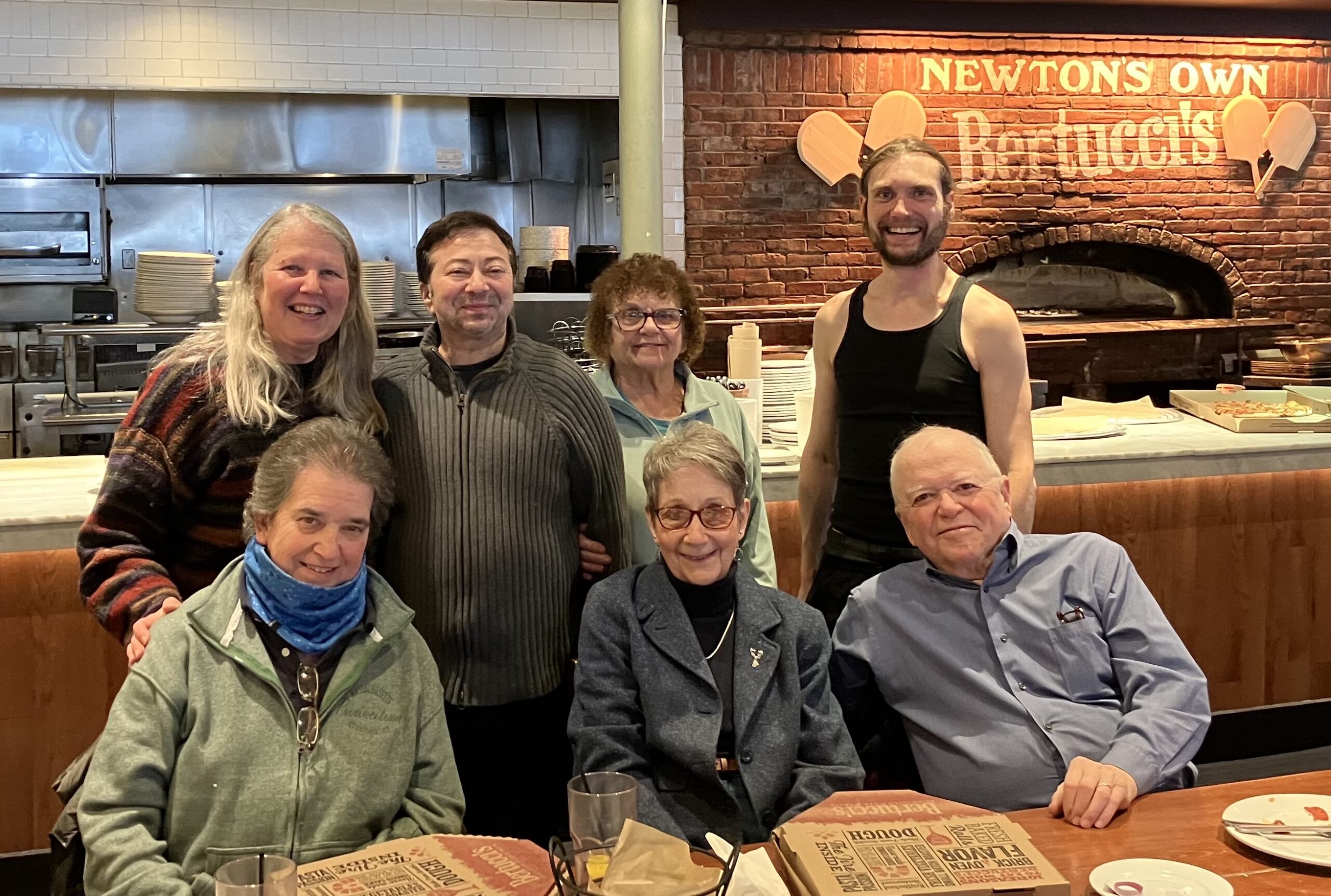 LGBTQ+ Newton members enjoying pizza at Bertucci's